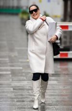 KELLY BROOK in a White Coat and Boots at Global Radio in London 12/23/2020