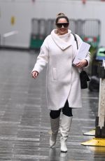 KELLY BROOK in a White Coat and Boots at Global Radio in London 12/23/2020