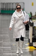 KELLY BROOK in a White Coat and Boots at Global Radio in London 12/23/2020