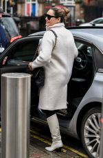 KELLY BROOK in a White Coat and Boots at Global Radio in London 12/23/2020