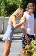 KIMBERLEY GARNER Drinking Fresh Coconut Water in Holetown 12/19/2020