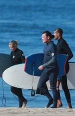 LARA BINGLE in Wetsuit Surfing in Malibu 12/03/2020