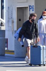 MARGARET QUALLEY and Shia LaBeouf Out Kissing at LAX Airport 12/19/2020