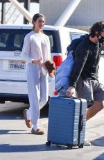 MARGARET QUALLEY and Shia LaBeouf Out Kissing at LAX Airport 12/19/2020