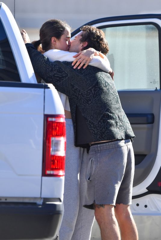 MARGARET QUALLEY and Shia LaBeouf Out Kissing at LAX Airport 12/19/2020