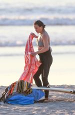 MICHELLE RODRIGUEZ in Bikini Surfing in Malibu 12/03/2020