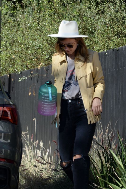 OLIVIA WILDE Outside Jason Sudeikis