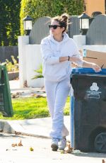 SARA SAMPAIO Cleaning Trash Outside Her Home in Los Angeles 12/10/2020