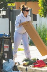 SARA SAMPAIO Cleaning Trash Outside Her Home in Los Angeles 12/10/2020