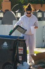 SARA SAMPAIO Cleaning Trash Outside Her Home in Los Angeles 12/10/2020