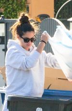 SARA SAMPAIO Cleaning Trash Outside Her Home in Los Angeles 12/10/2020