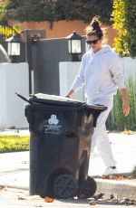 SARA SAMPAIO Cleaning Trash Outside Her Home in Los Angeles 12/10/2020
