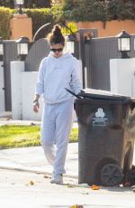 SARA SAMPAIO Cleaning Trash Outside Her Home in Los Angeles 12/10/2020