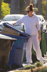 SARA SAMPAIO Cleaning Trash Outside Her Home in Los Angeles 12/10/2020