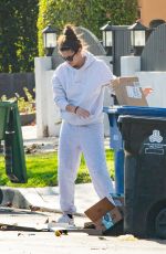SARA SAMPAIO Cleaning Trash Outside Her Home in Los Angeles 12/10/2020
