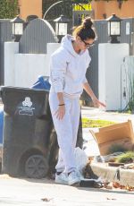 SARA SAMPAIO Cleaning Trash Outside Her Home in Los Angeles 12/10/2020