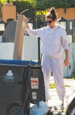 SARA SAMPAIO Cleaning Trash Outside Her Home in Los Angeles 12/10/2020