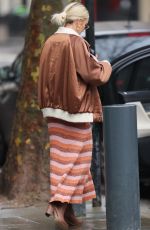 ASHLEY ROBERTS Arrives at Heart Radio in London 01/12/2021