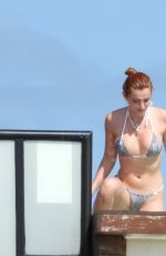 BELLA THORNE in Bikini at a Hotel Pool in Tulum 01/09/2021
