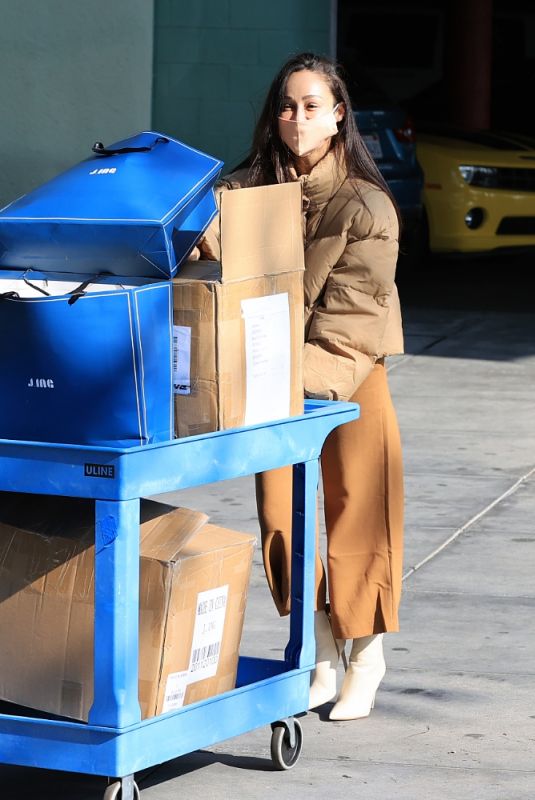 CARA SANTANA Helps Out the Homeless at a Local Clothing Drive in Los Angeles 01/06/2021