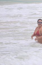 CHIQUIS RIVERA in a Red Bikini at a Beach in Tulum 01/22/2021