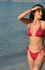 CHLOE VEITCH in a Red Bikini at a Beach in Dubai 01/25/2021