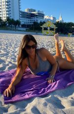 CLAUDIA ROMANI Promotes Basic Vegan at Miami Beach 01/11/2021