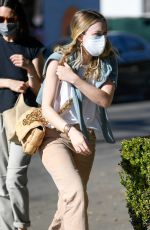 DAKOTA FANNING Out Shopping on Melrose Place in West Hollywood 01/16/2021