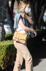 DAKOTA FANNING Out Shopping on Melrose Place in West Hollywood 01/16/2021
