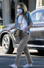 DAKOTA FANNING Out Shopping on Melrose Place in West Hollywood 01/16/2021