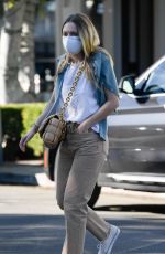 DAKOTA FANNING Out Shopping on Melrose Place in West Hollywood 01/16/2021