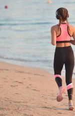 GEORGIA HARRISON Out Jogging at a Beach in Dubai 01/16/2021