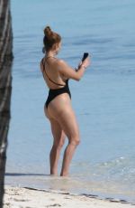 JENNIFER LOPEZ in Swimsuit Paddle-boarding in Turks and Caicos 01/06/2021