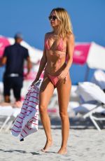 KIMBERLEY GARNER in a Pink Bikini at a Beach in Miami 01/27/2021
