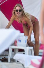 KIMBERLEY GARNER in a Pink Bikini at a Beach in Miami 01/27/2021