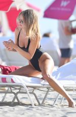 KIMBERLEY GARNER in Swimsuit at a Beaqch in Miami 01/25/2021