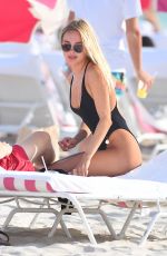 KIMBERLEY GARNER in Swimsuit at a Beaqch in Miami 01/25/2021