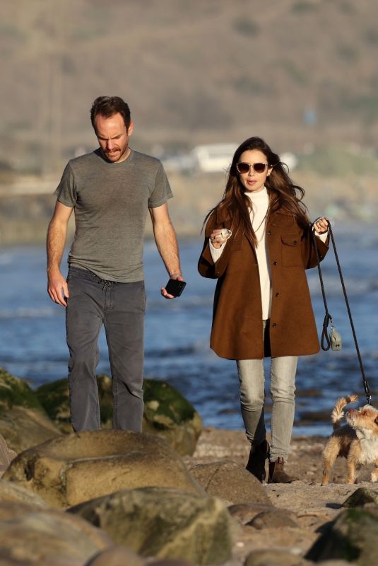 LILY COLLINS and Charlie McDowell Out with Their Dog at a Beach in Santa Barbara 01/10/2021