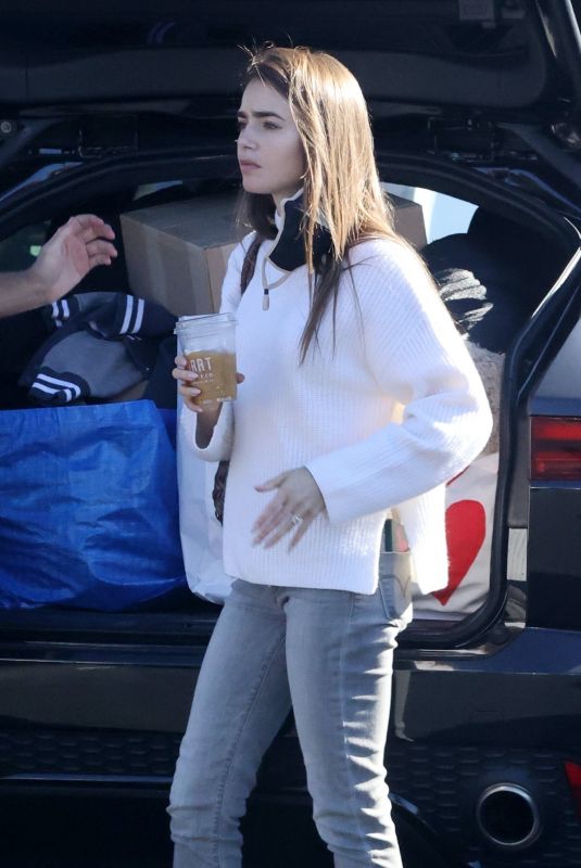 LILY COLLINS at a Recycling Center in Los Angeles 01/13/2021