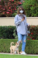 LILY COLLINS in Ripped Denim Out with Her Dog in Los Angeles 01/22/2021