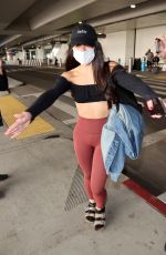 MIYA PONSETTO Arrives at LAX Airport in Los Angeles 01/10/2021