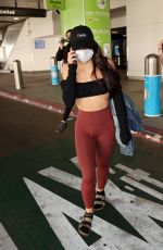 MIYA PONSETTO Arrives at LAX Airport in Los Angeles 01/10/2021