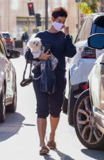 NICOLE MURPHY Out with Her Dog in Los Angeles 01/26/2021