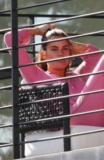 SARA SAMPAIO on Her Balcony in Los Angeles 01/12/2021