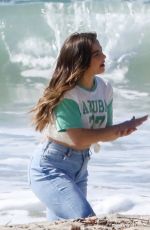 ADDISON RAE at a Photoshoot on the Beach in Malibu 02/04/2021