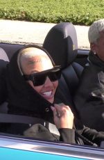 AMBER ROSE and Alexander Edwards Out in Their New Baby Blue Convertible Rolls-Royce in Beverly Hills 02/05/2021