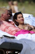 AMELIA HAMLIN in Bikini and Scott Disick at a Beach in Miami 02/12/2021