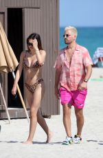 AMELIA HAMLIN in Bikini and Scott Disick at a Beach in Miami 02/12/2021