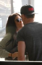 AUDRA MADRI and Josh Duhamel at LAX Airport in Los Angeles 02/04/2021