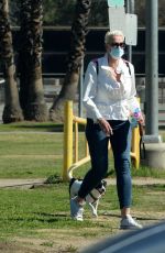 BRIGITTE NIELSEN Out with her Dog at a Park in Los Angeles 02/07/2021